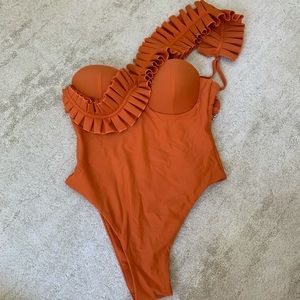 burnt orange Andrea Iyamah swimsuit